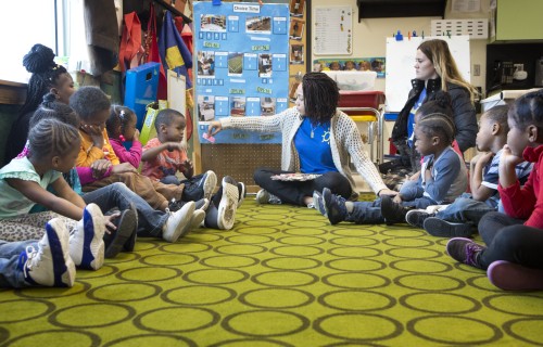 Operation Breakthrough preschool teacher leads students through lesson.