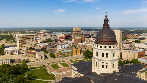 Birds eye view of Topeka, and the KS state capitol building.