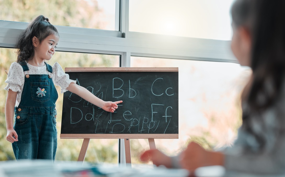 Student learning the alphabet