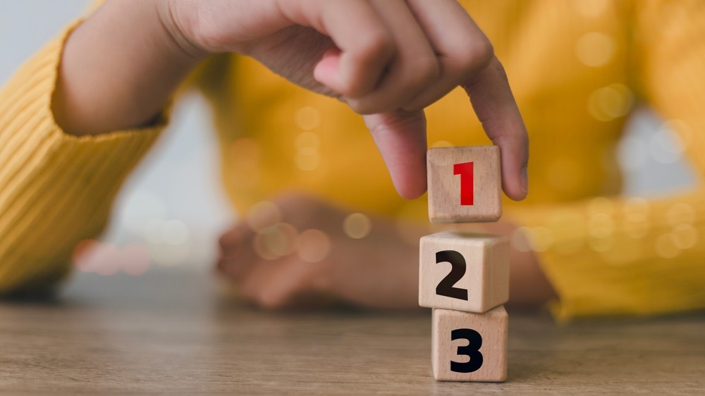 Student with number blocks. 